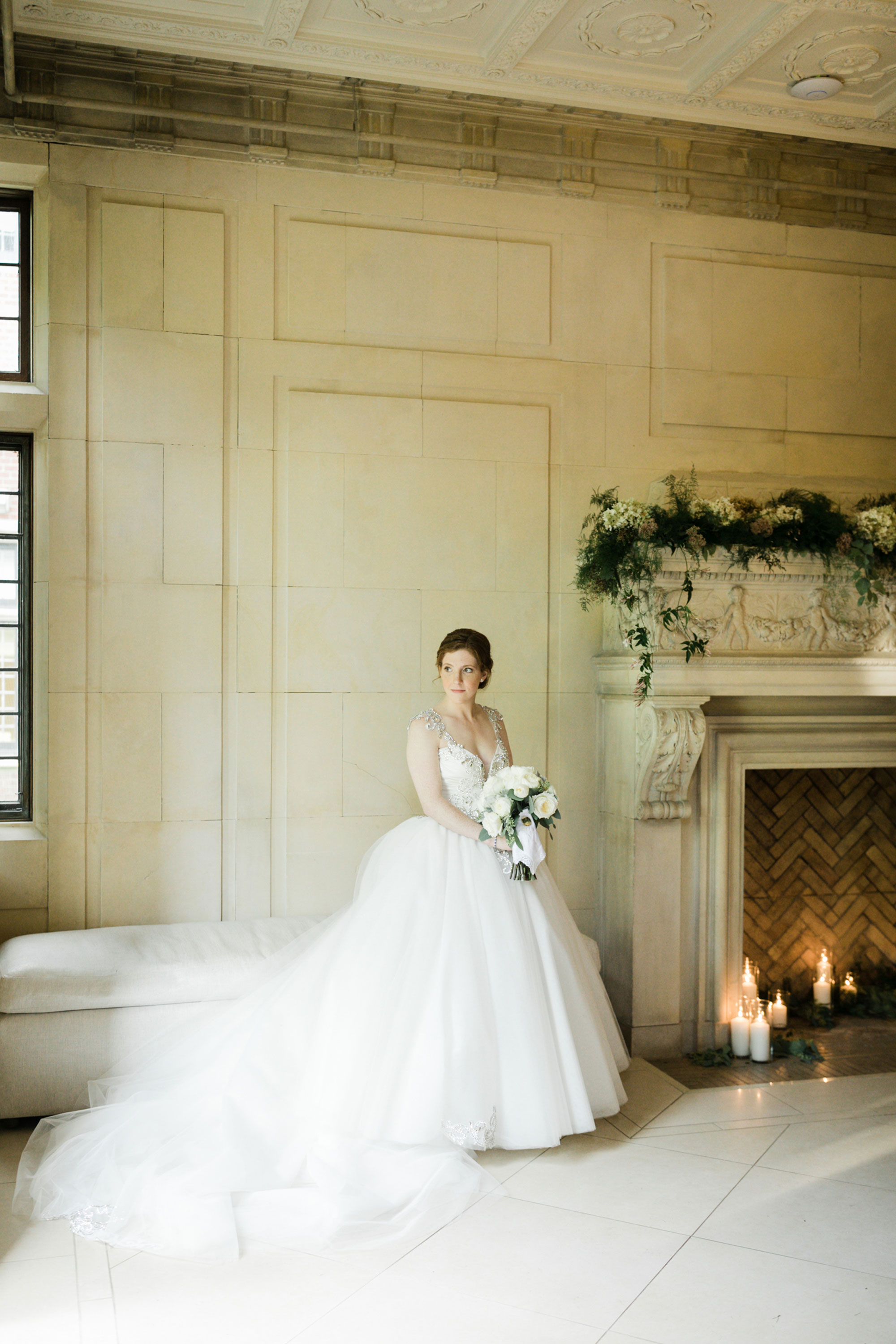 The Mansion at Natirar Fireplace Decor and Bride in Pnina Tornai Wedding Gown