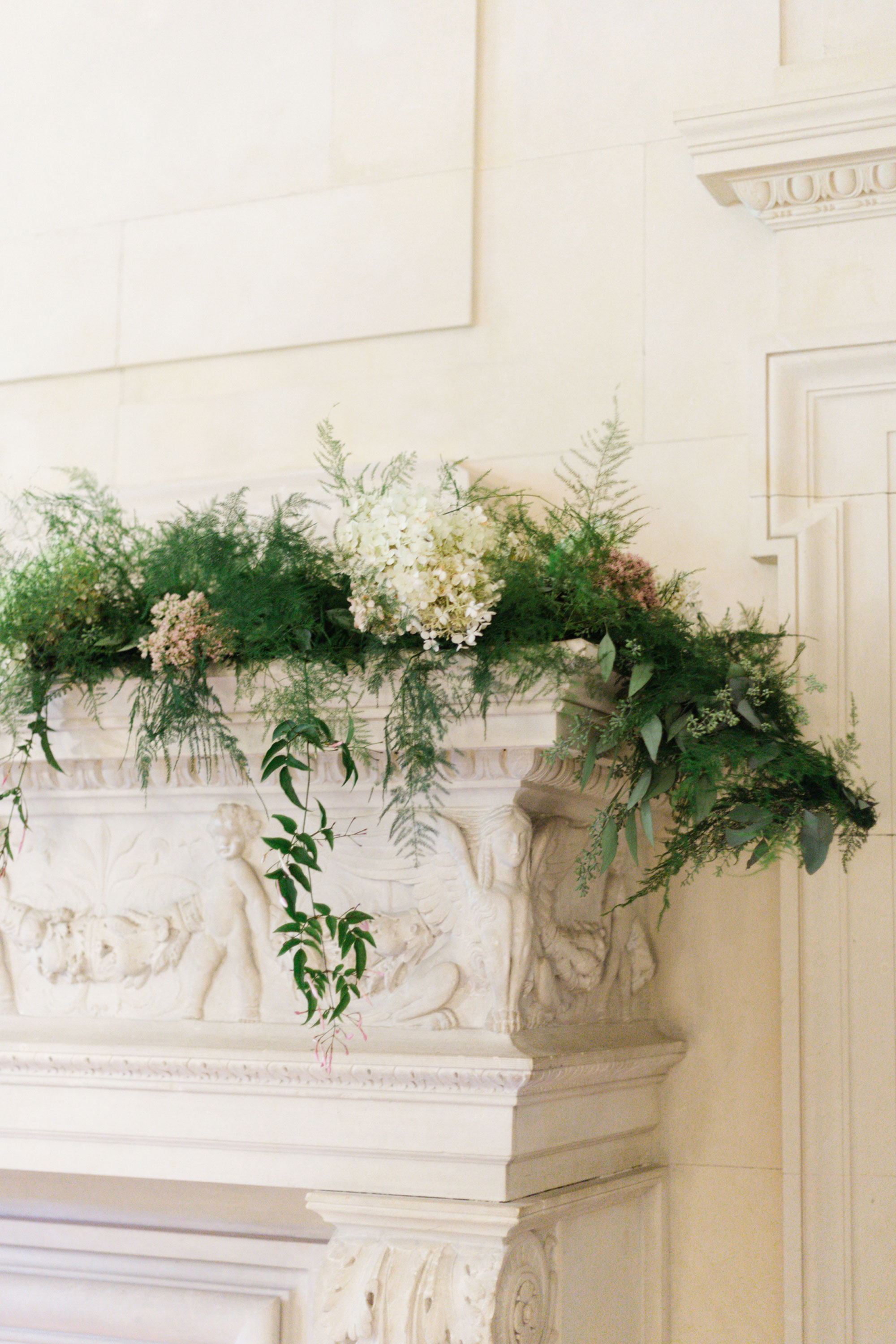 Fireplace decor for a wedding at the Mansion at Natirar by David Beahm and NYC Wedding Planner