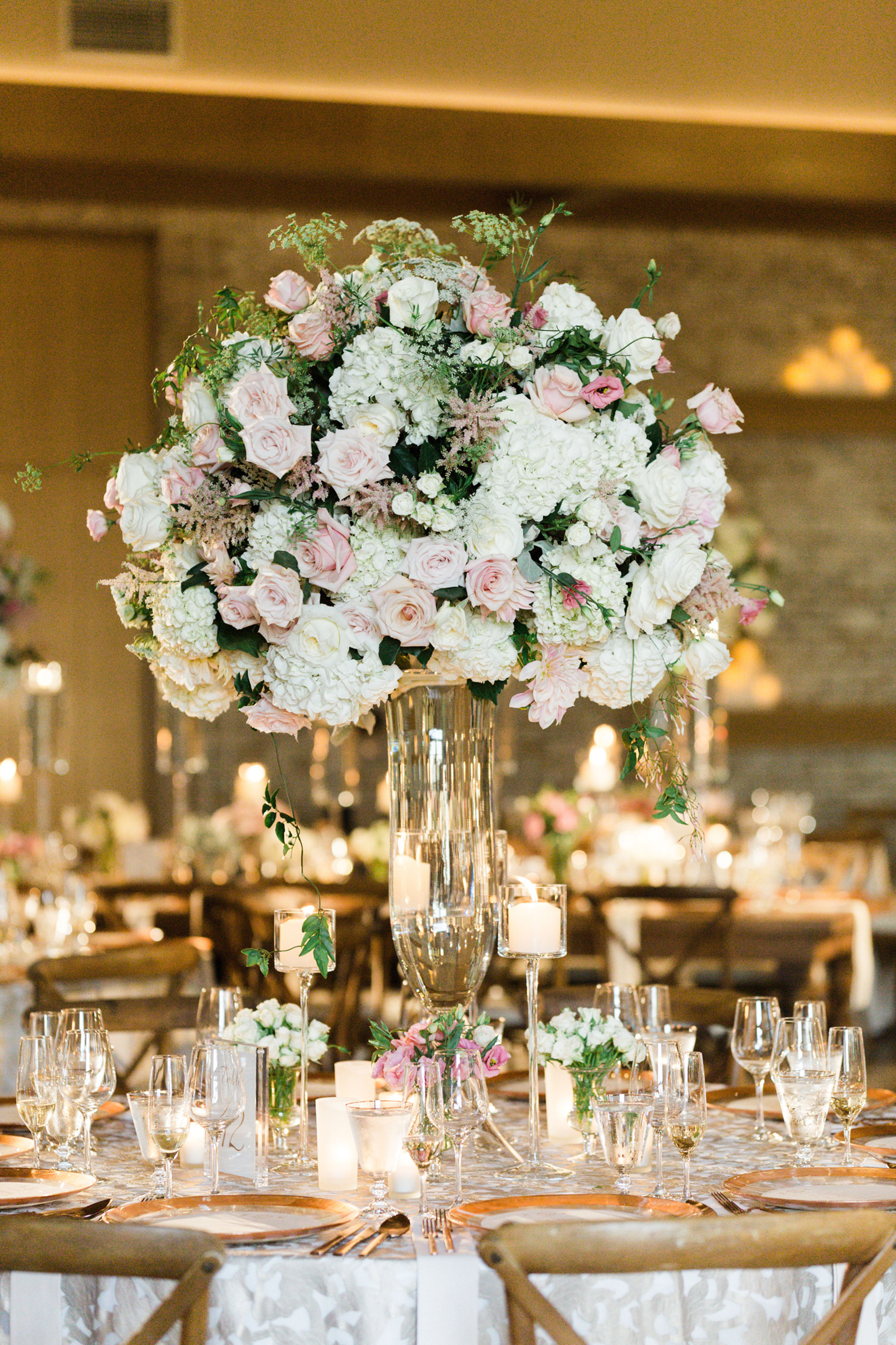 Tall centerpiece flowers at the Mansion at Natirar by David Beahm Experiences and NYC Wedding Planner Simply Sunshine Events