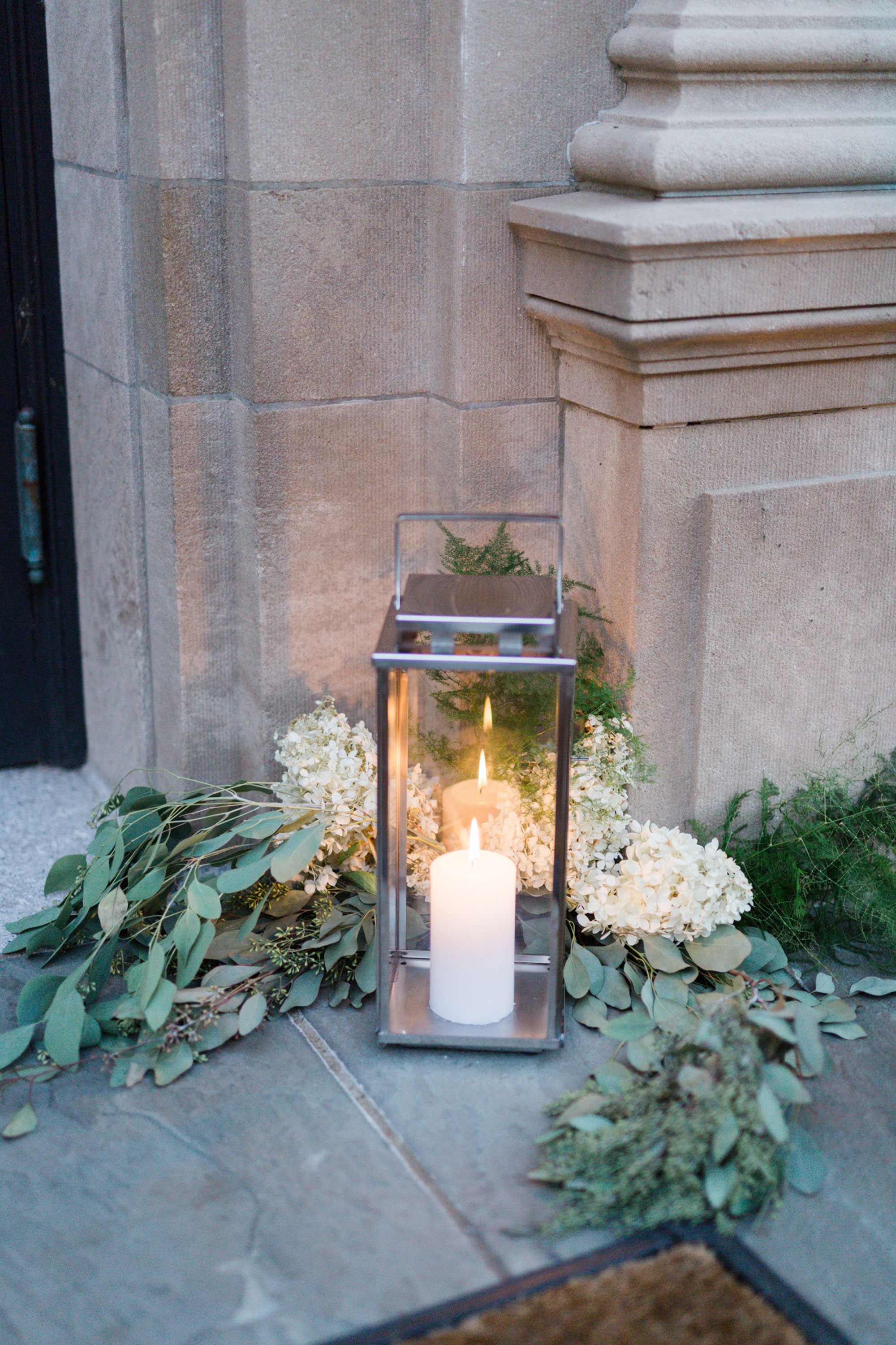 Wedding entrance lantern and candle decor at the Mansion at Natirar and NJ wedding planner